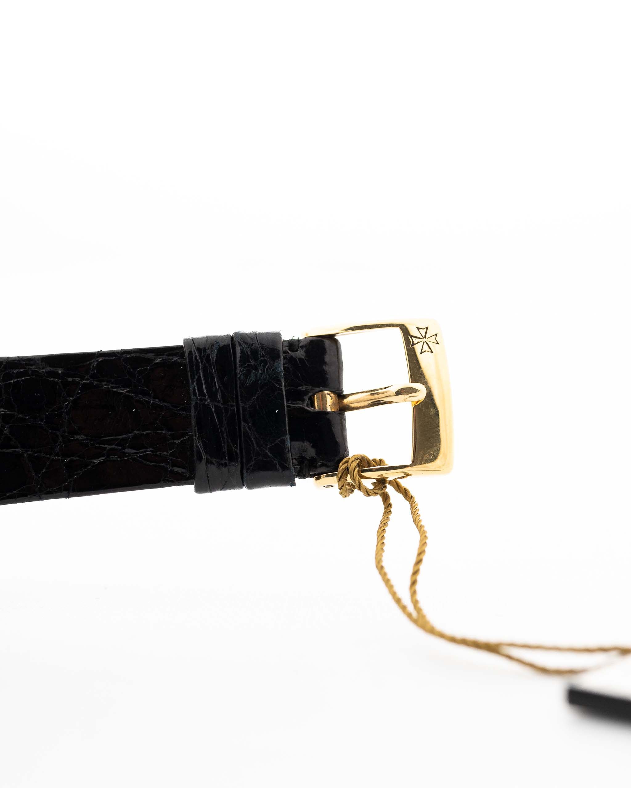 Closeup Photo of a Vacheron Constantin 71203 Harmony 18k from the 1980s. 23mm with 18k Yellow Gold Case, Quartz Movement, Black Dial, Original Leather Strap and 18k Gold Buckle.