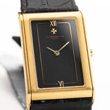 Closeup Photo of a Vacheron Constantin 71203 Harmony 18k from the 1980s. 23mm with 18k Yellow Gold Case, Quartz Movement, Black Dial, Original Leather Strap and 18k Gold Buckle.