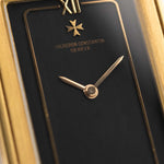 Closeup Photo of a Vacheron Constantin 71203 Harmony 18k from the 1980s. 23mm with 18k Yellow Gold Case, Quartz Movement, Black Dial, Original Leather Strap and 18k Gold Buckle.