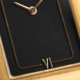 Closeup Photo of a Vacheron Constantin 71203 Harmony 18k from the 1980s. 23mm with 18k Yellow Gold Case, Quartz Movement, Black Dial, Original Leather Strap and 18k Gold Buckle.