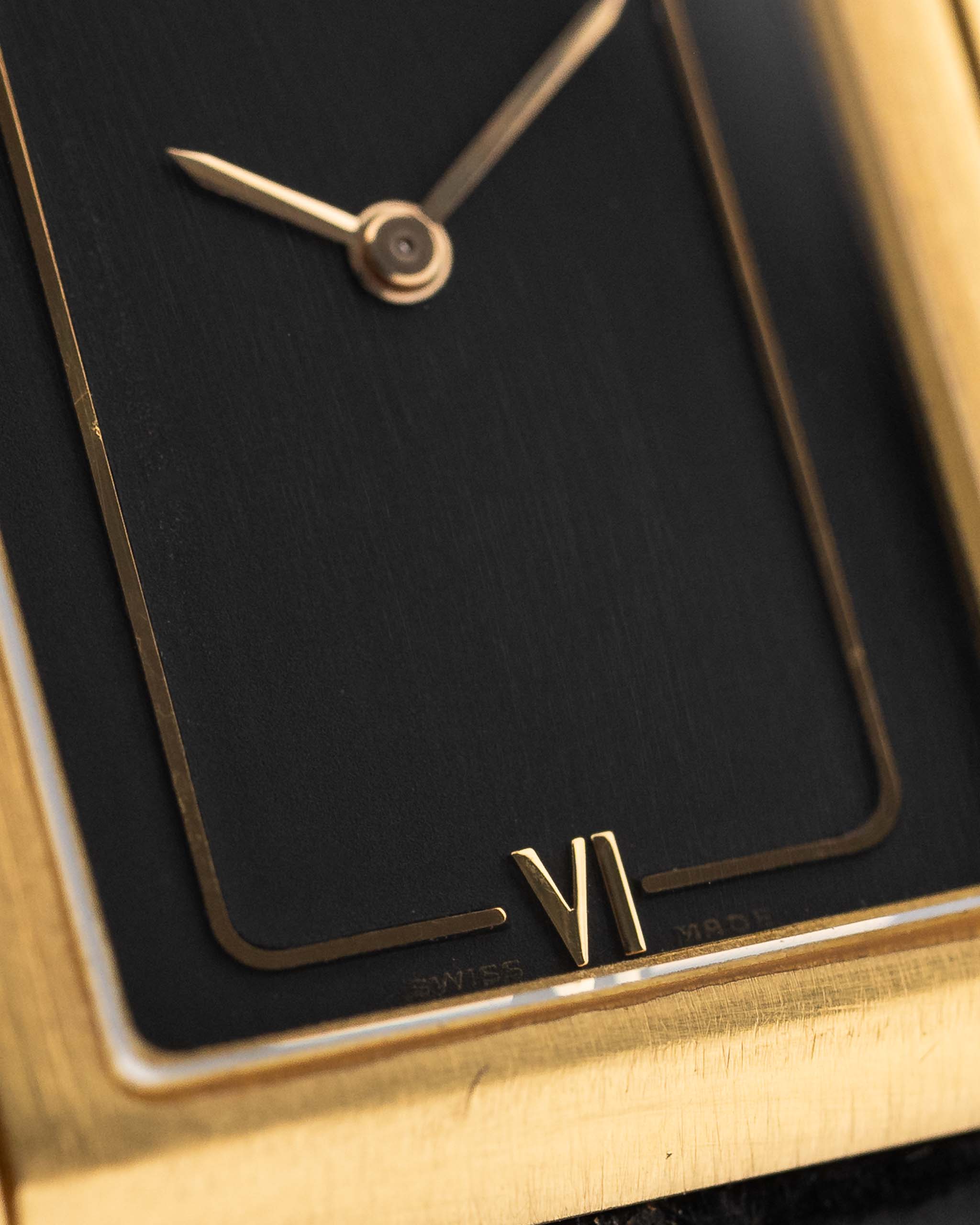 Closeup Photo of a Vacheron Constantin 71203 Harmony 18k from the 1980s. 23mm with 18k Yellow Gold Case, Quartz Movement, Black Dial, Original Leather Strap and 18k Gold Buckle.