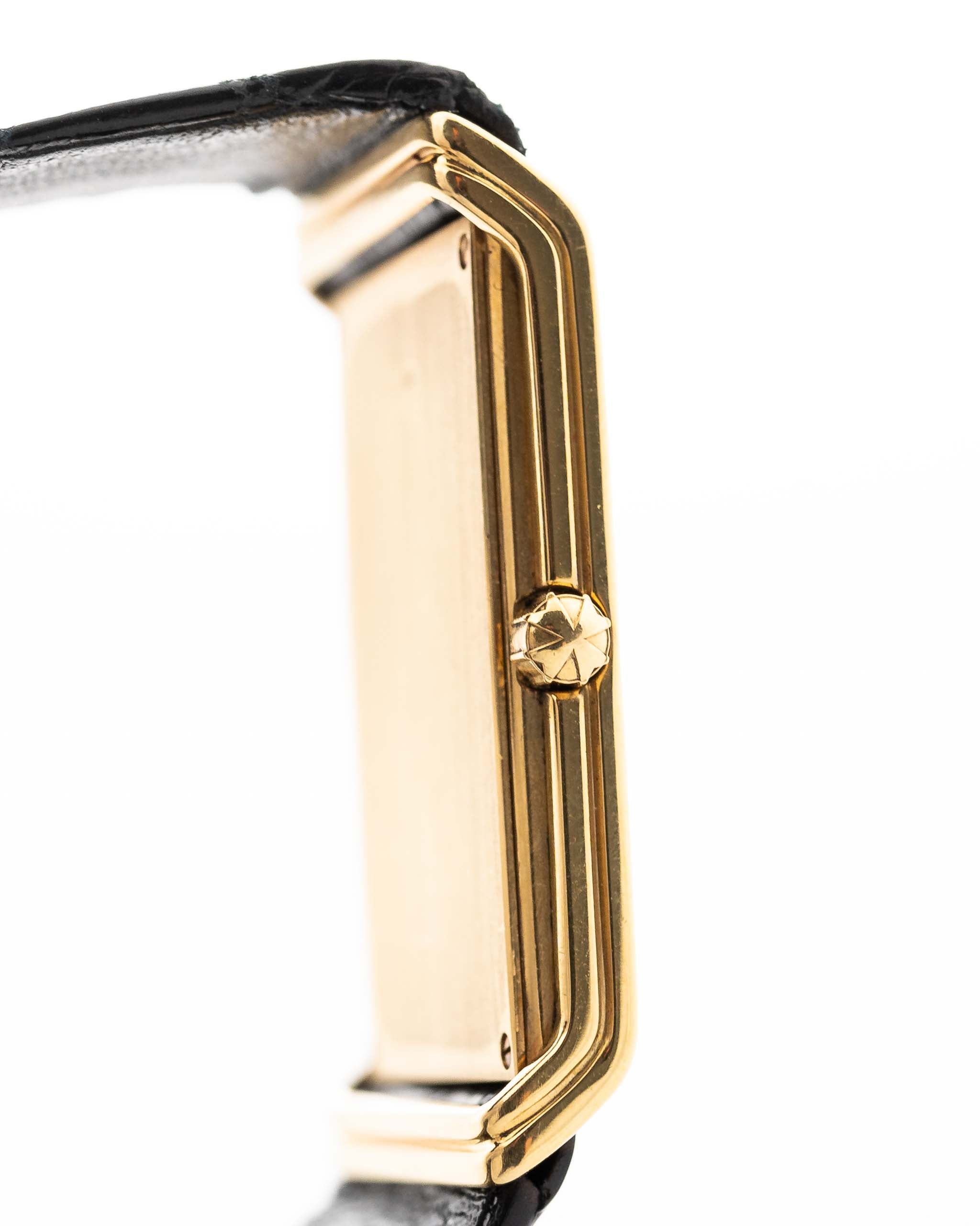 Closeup Photo of a Vacheron Constantin 71203 Harmony 18k from the 1980s. 23mm with 18k Yellow Gold Case, Quartz Movement, Black Dial, Original Leather Strap and 18k Gold Buckle.