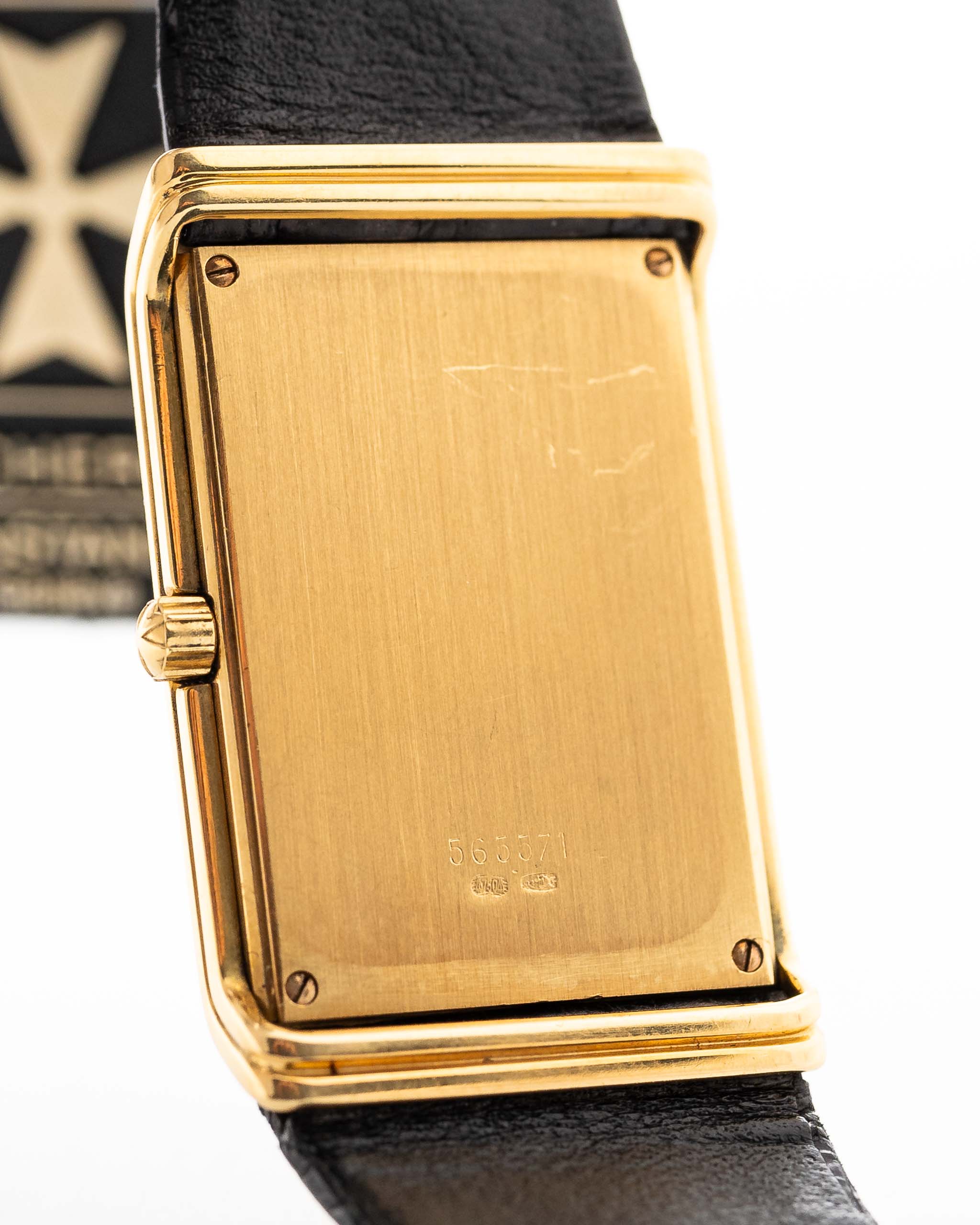 Closeup Photo of a Vacheron Constantin 71203 Harmony 18k from the 1980s. 23mm with 18k Yellow Gold Case, Quartz Movement, Black Dial, Original Leather Strap and 18k Gold Buckle.
