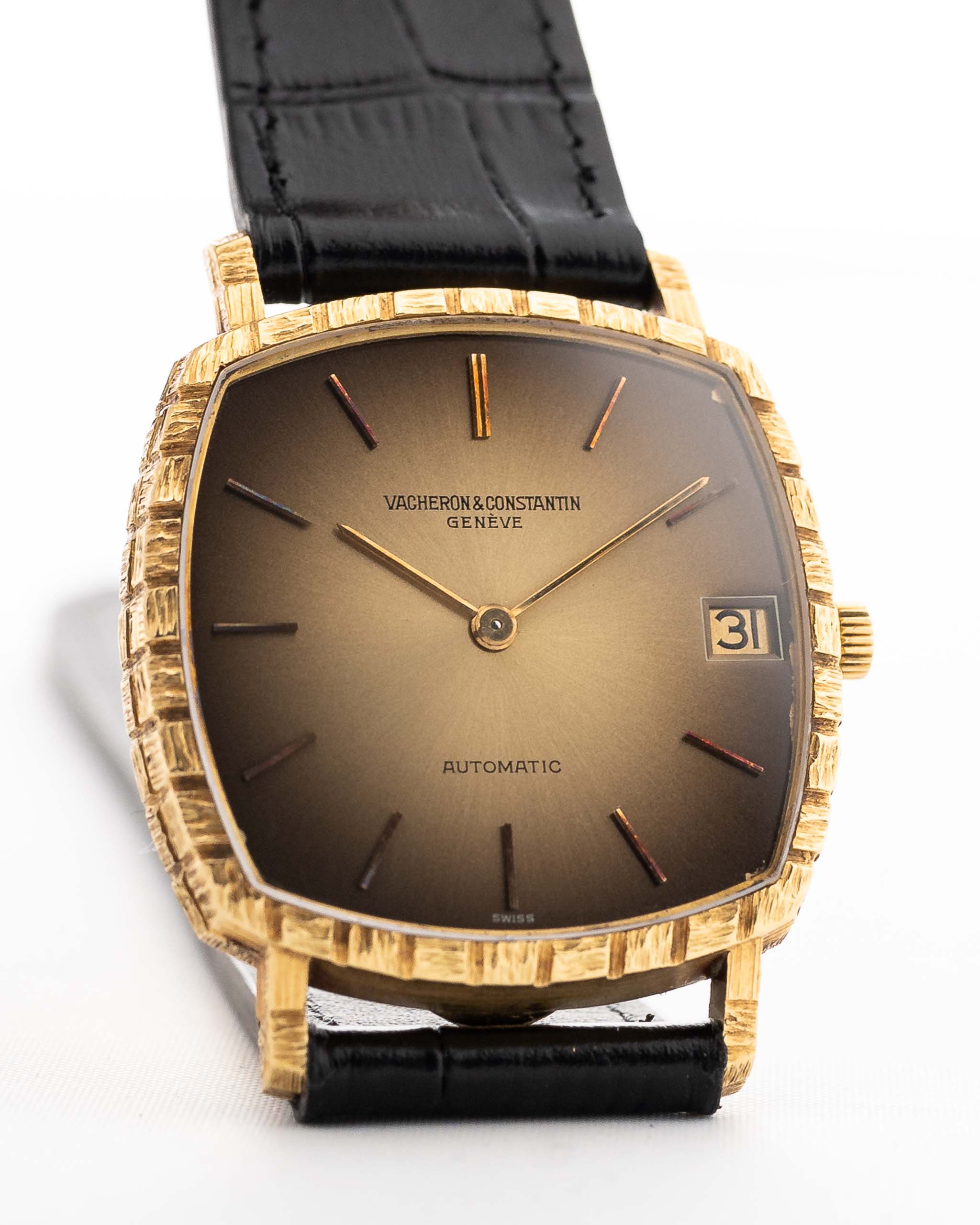 Closeup Photo of a Vacheron Constantin 7390 Basket Ombre from the 1970s. 32mm case in 18k Yellow Gold with Automatic Cal. K1121, Original golden ombre dial and Leather Strap.