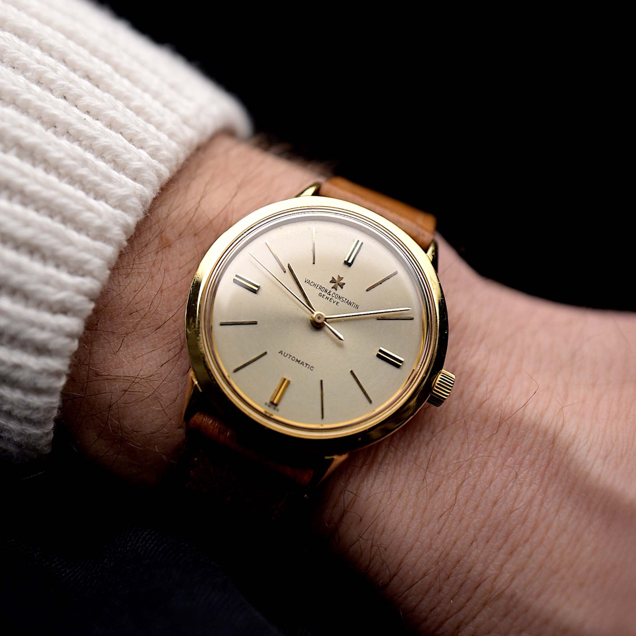 Photo of a Vacheron Constantin 6592 Automatic from the 1960s on a wrist. 35.5mm case in 18k Yellow Gold Case with Automatic Movement, Original Silver Dial and Leather Strap.