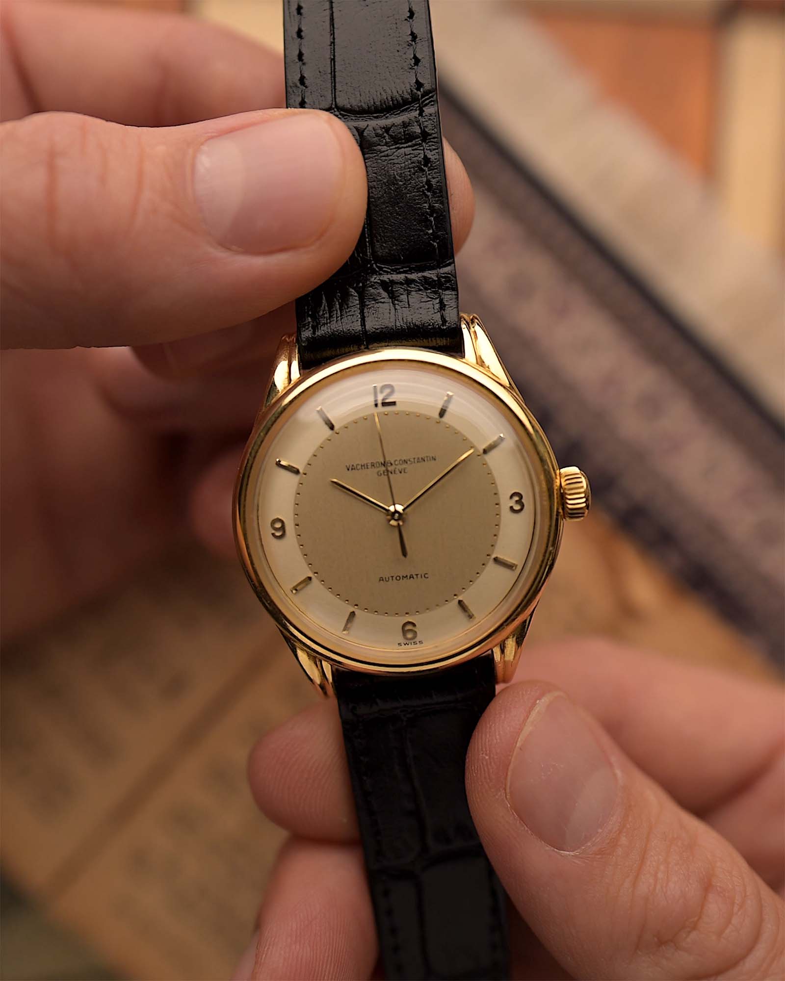Vintage Vacheron Constantin Patrimony Spillmann Watch. 18k Yellow Gold case, Champagne two-tone dial, Automatic movement and Leather strap.