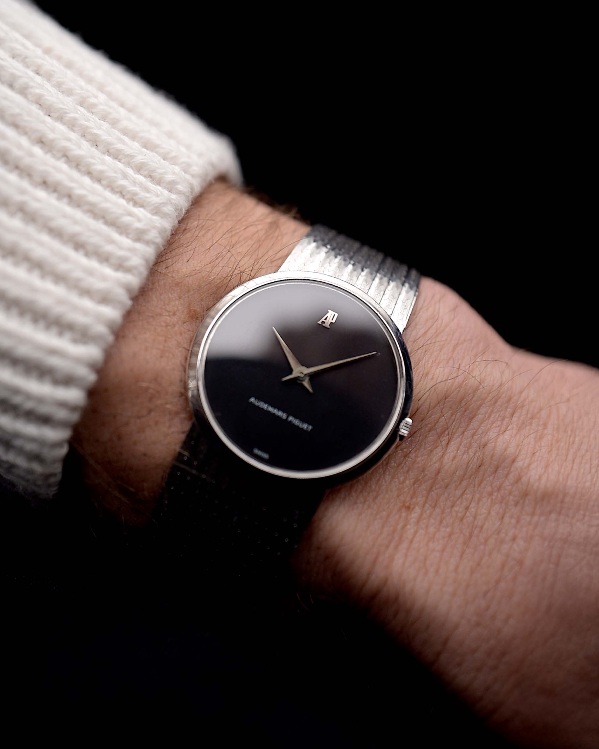 Video of a Audemars Piguet 18k Black from the 1970s on a wrist. 31.5mm 18k White Gold Case with Manual wind Cal. 2003, Deep black dial and 18k White Gold Bracelet.