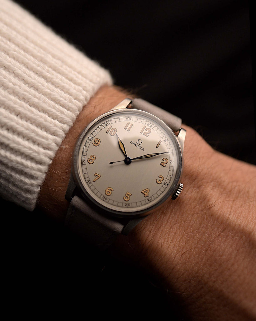 Vintage Omega Jumbo Radium from 1935 on a wrist. 37.5mm with Stainless Steel Case, Manual Wind Movement, Original Silver Railroad Dial and Leather Strap.