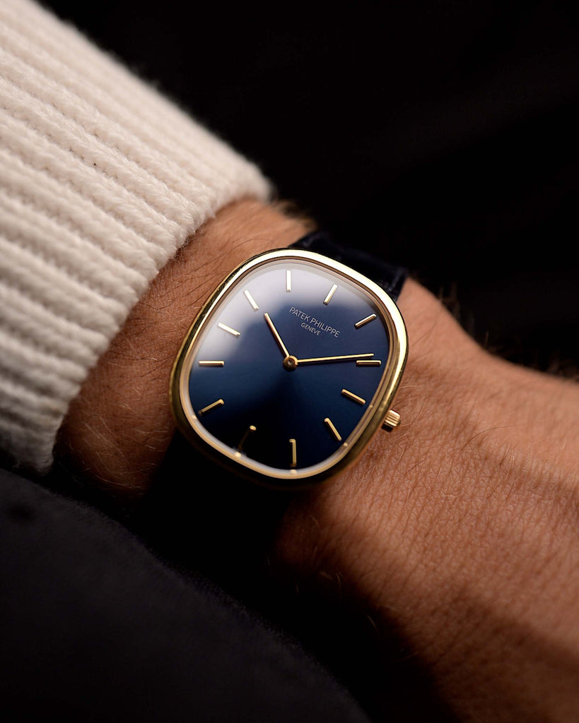Vintage Patek Philippe 3738 Ellipse Jumbo from the 2000s on a wrist. 31mm in 18k Yellow Gold with Automatic Cal. 240, Blue Sunburst Dial and Original Patek Philippe Leather Strap.