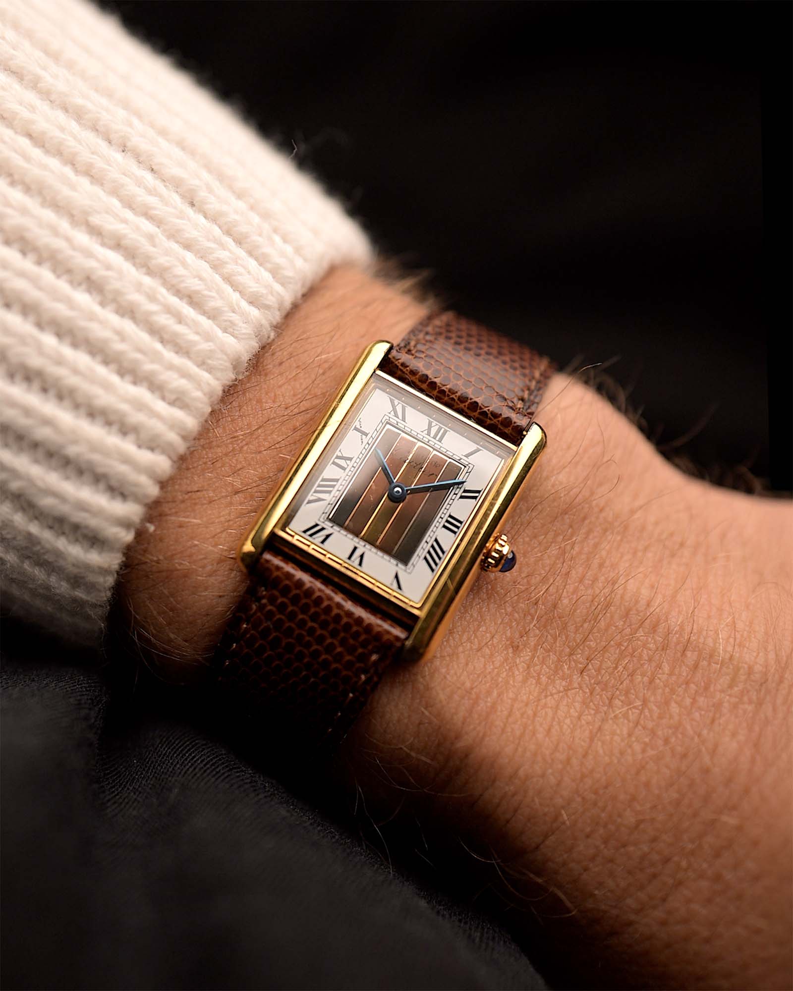 Vintage Jaeger LeCoultre 9120 Vogue Watch from the 1970s on a wrist. 28mm in Great condition with Stainless Steel Case, Manual Wind Movement, Original Silver Dial and Leather Strap.
