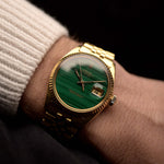 Video of a Rolex 1601 Datejust 18k Malachite from 1968 on a wrist. 36mm in 18K Yellow Gold with Original green Malachite Dial, Automatic Caliber 1570 and Original Jubilee Bracelet.