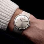Video of a Patek Philippe 3520 Calatrava 18k from the 1970s on a wrist. 32mm 18k White Gold Case with Manual Wind Movement, Original Silver Sunburst Dial and White Gold Bracelet.