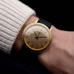 Video of a Patek Philippe Calatrava 3569 Hammered 1970 on a wrist. 36mm case in 18k Yellow Gold Case wth Hammered Gold Dial, Automatic Movement and Original Leather Strap.