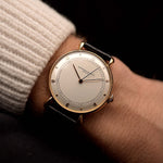 Vintage Vacheron Constantin Teardrop watch in 18k rose gold, white-silver dial, manual Cal. V454, on black strap on a wrist, black background, video