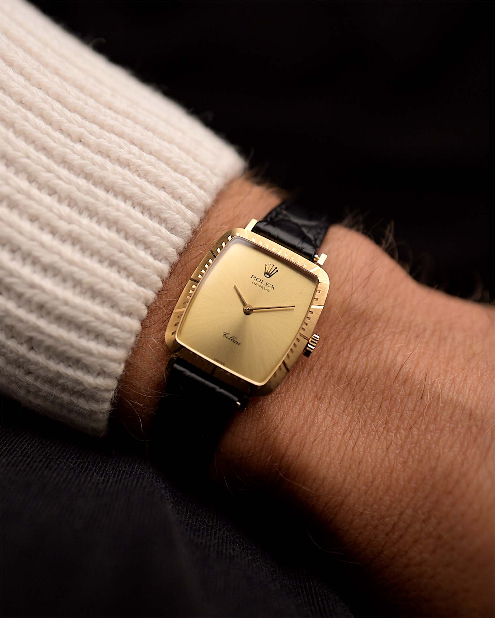 Vintage Rolex Cellini 4080 Rectangular from 1981 on a wrist. 23mm in 18k Yellow Gold Case with Manual Wind Movement, Golden Sunburst Dial and Leather Strap.
