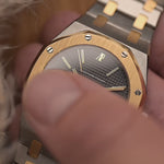 Vintage Audemars Piguet 4100SA Royal Oak Watch from the 1980s. 36mm in Stainless Steel & 18k Yellow Gold with Rare flawless grey tapisserie dial, Two-Tone bracelet and Automatic movement.