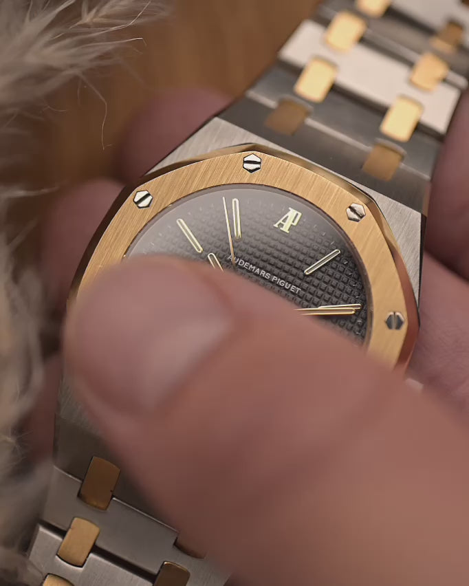 Vintage Audemars Piguet 4100SA Royal Oak Watch from the 1980s. 36mm in Stainless Steel & 18k Yellow Gold with Rare flawless grey tapisserie dial, Two-Tone bracelet and Automatic movement.