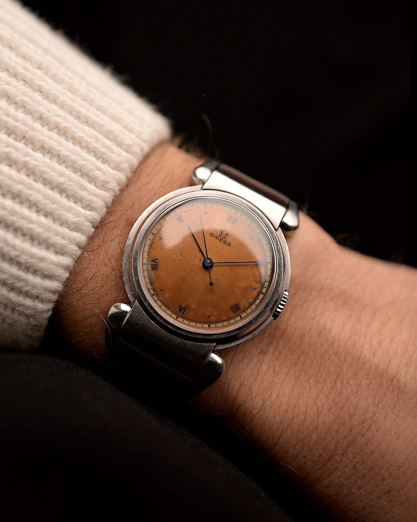Vintage Omega Big Scarab Copper 1939 watch, 35mm stainless steel case, original copper dial with patina, manual wind movement, leather strap, video