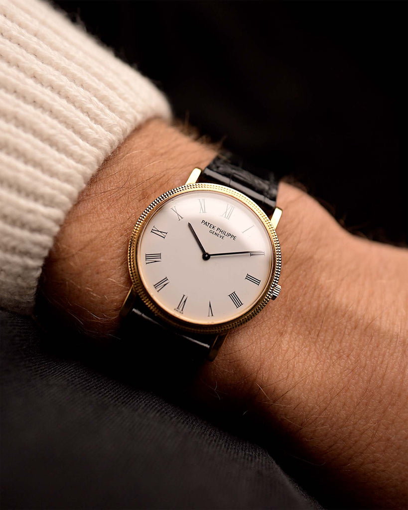 Vintage Patek Philippe Calatrava 3520 Watch Roman 1990s. 37mm with Yellow gold case, Automatic movement, Roman numeral dial and Leather Strap.