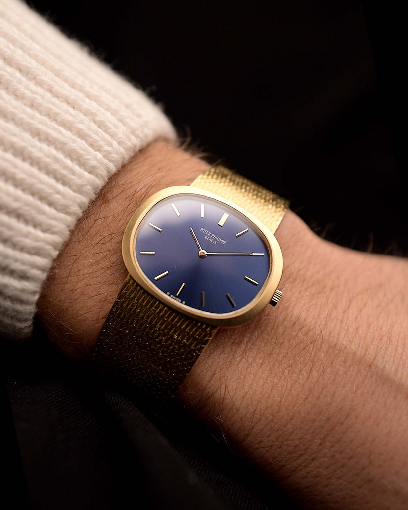Vintage Patek Philippe 3583 Ellipse d’Or watch from 1970s, 34mm 18k yellow gold case, manual Caliber 175, blue sunburst dial, gold bracelet, video