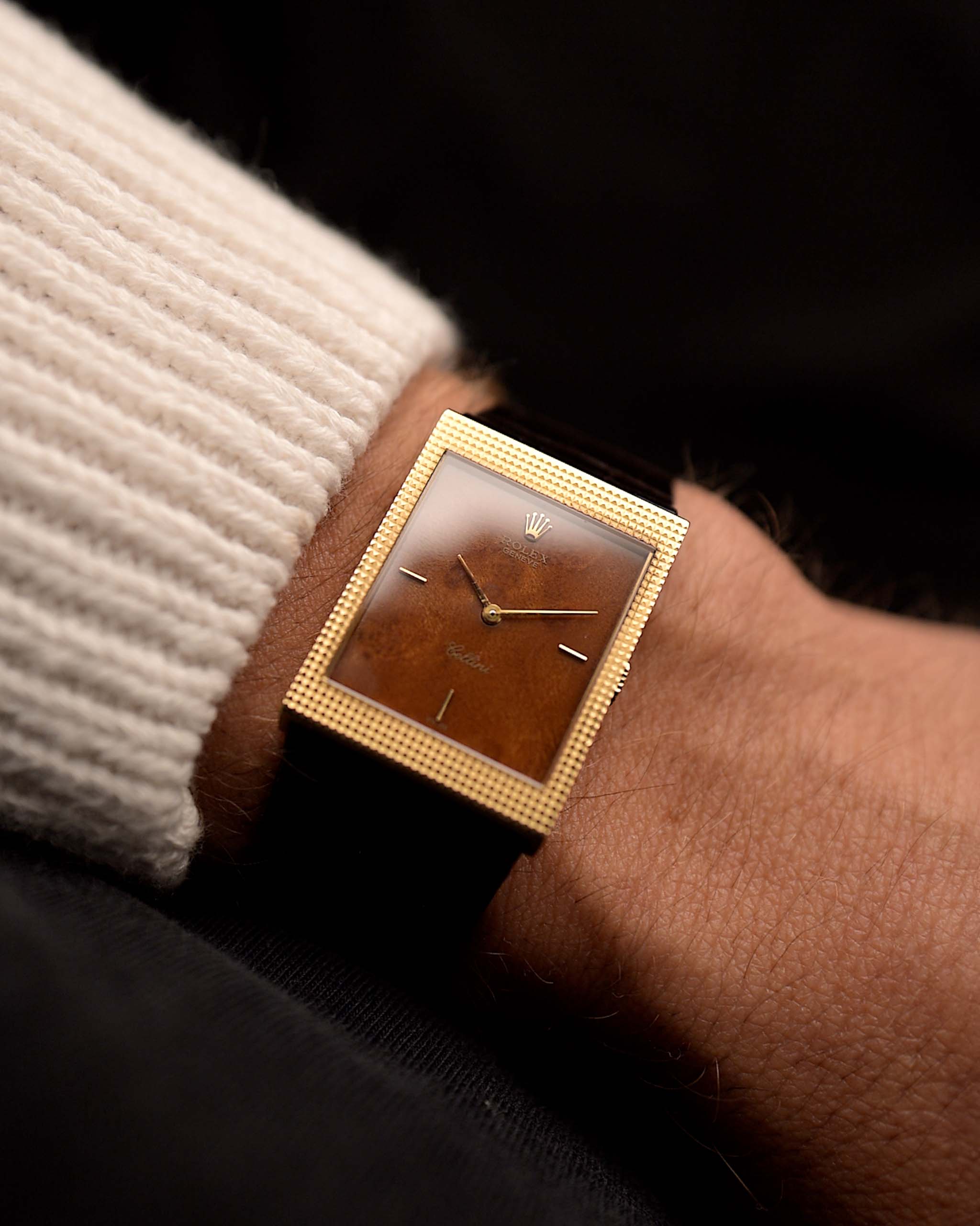 Vintage Rolex Cellini Watch 4127 Wood from 1990 on a wrist. 24mm with 18k yellow gold case, Flawless wood dial, Manual wind movement and Brown Rolex leather strap.