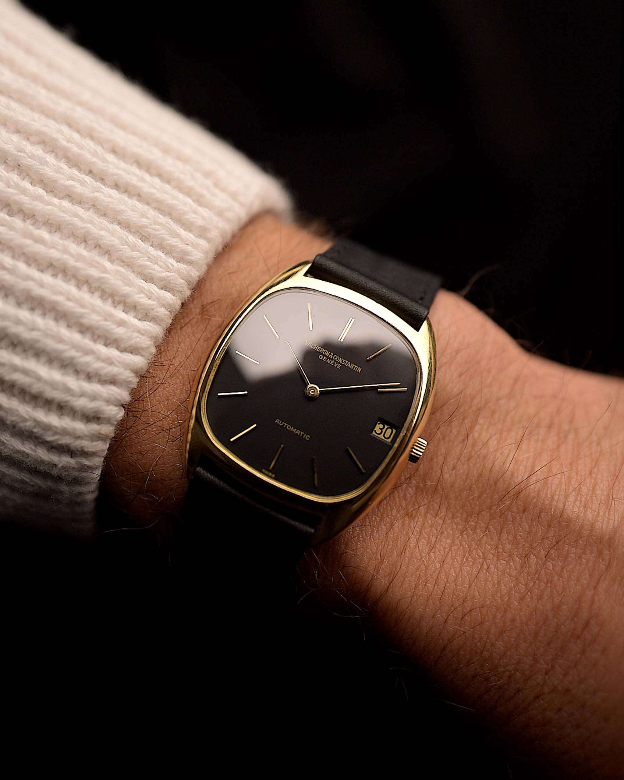 Vintage Vacheron Constantin 2020 Tonneau from the 1950s on a wrist. 32mm with 18k Yellow Gold Case, Automatic Cal. K1121, Original matte black dial and black Leather strap.