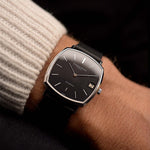 Vintage Vacheron Constantin 7390 Square Black from the 1970s on a wrist. 32mm with 18k White Gold Case, Automatic Caliber K1121, Original black dial and black Leather Strap.