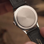 Vintage Omega watch Gilt Syringe from 1939, 33mm stainless steel case, black gilt dial, manual wind movement, black leather strap