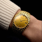 Audemars Piguet Cobra Jumbo from the 1970s with Ref. 5403 on a wrist. 35mm in 18k Yellow Gold with Automatic Cal. 2121, Original Diamond Dial, Gold Bracelet in Excellent Condition.