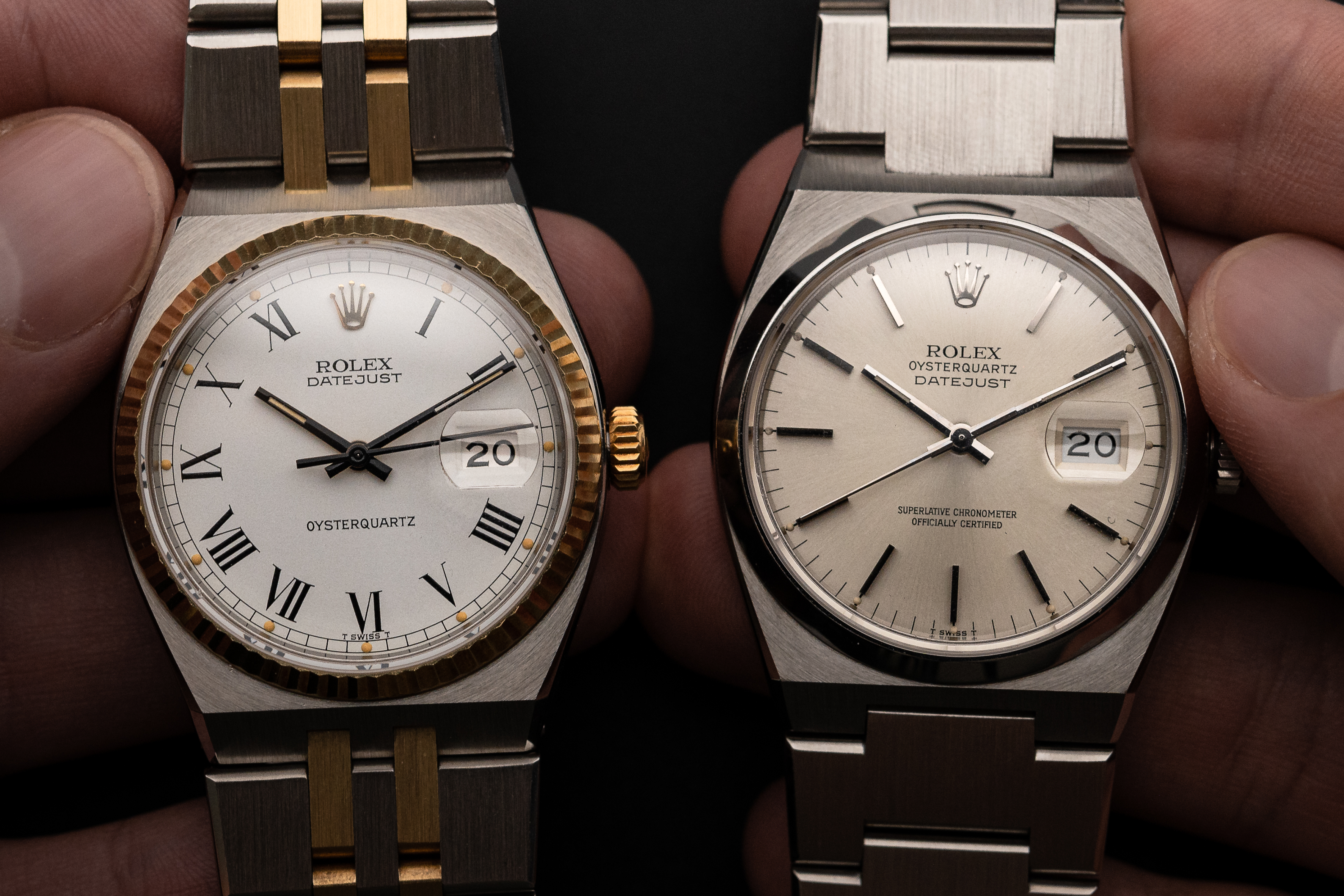 zwei alte Rolex Oysterquartz aus den 1980er Jahren in der Hand