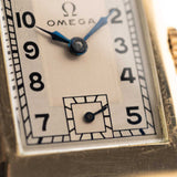Omega Art Deco T17, rechteckig, 14 Karat, zweifarbig, 1935
