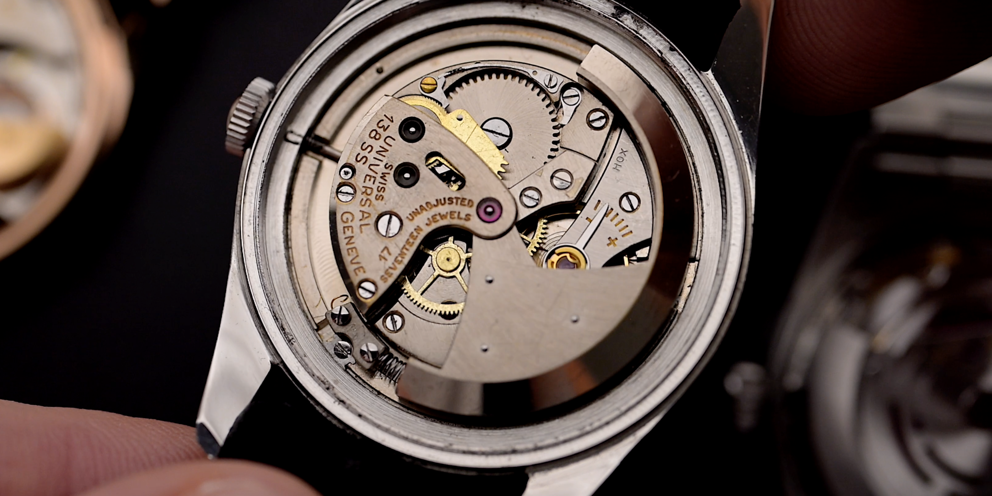 vintage 1950s Universal Geneve Polerouter con parachoques automático