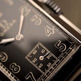 Omega Rectangular Negro Dorado 1939