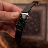 Jeringa rectangular dorada Omega 1930s