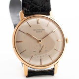 Reloj Vintage Patek Philippe 2598 Calatrava Rosa 18k de los años 50. 33 mm con caja de oro rosa de 18 quilates, movimiento de cuerda manual, esfera plateada impecable y correa de piel original.