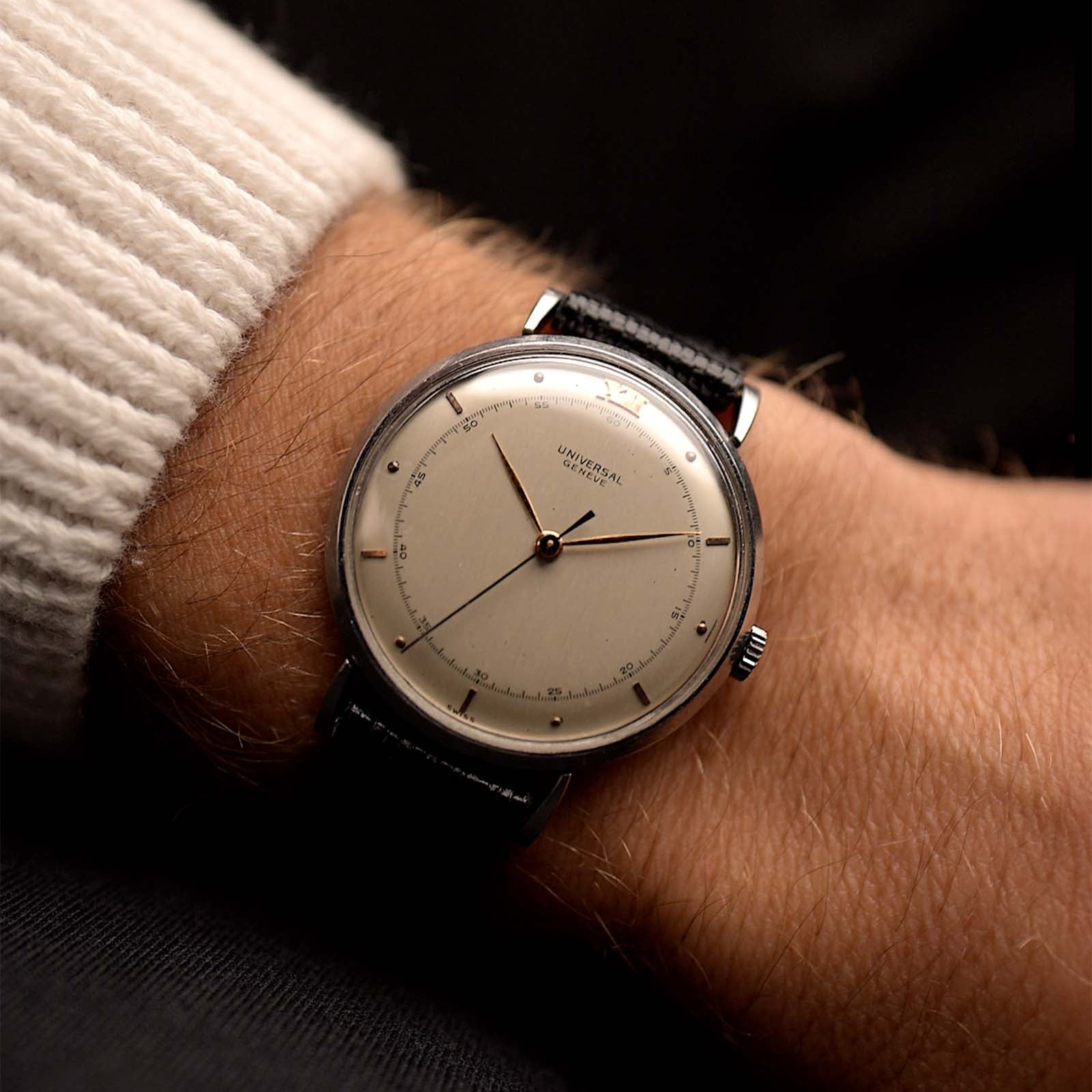 Vintage Universal Geneve 20706 Cal. 263 Major Twelve from 1945 on a wrist. 35mm with Stainless Steel Case, Manual Cal. 263 movement, Silvered dial, Leaf hands and Black Leather strap.