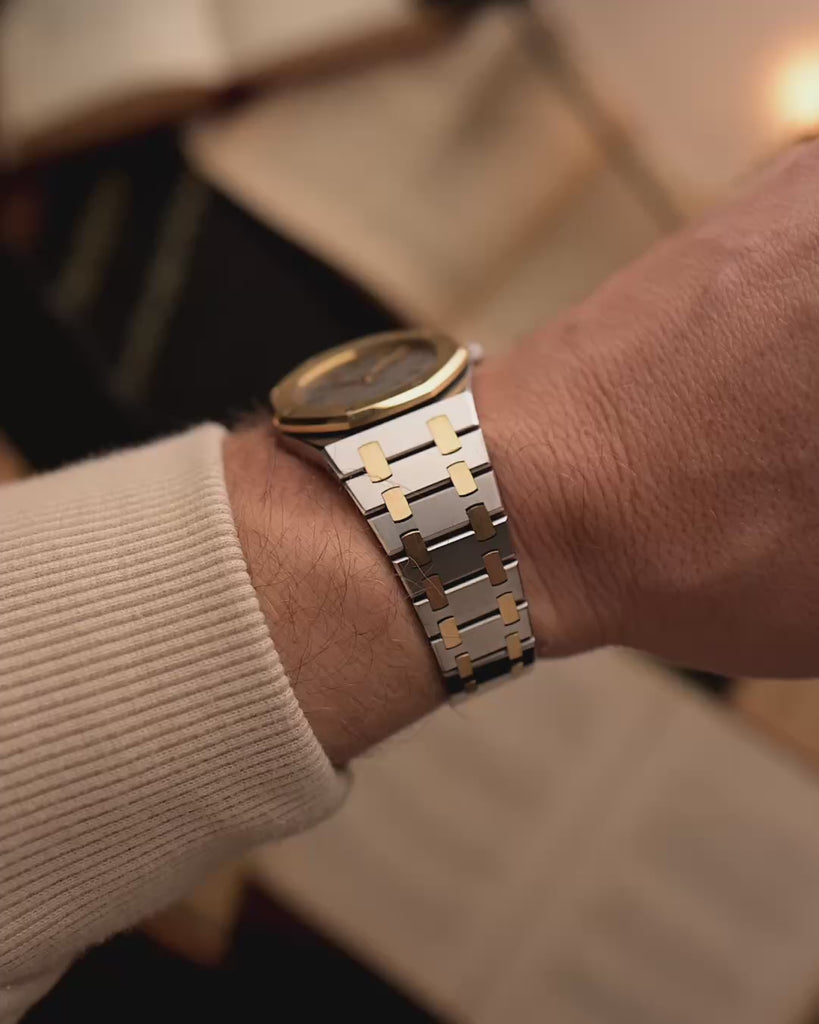 Audemars Piguet Royal Oak 14486SA Vintage Watch on a wrist on a blurred background.