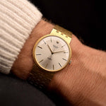 Vintage Rolex Cellini 3661 watch 18k from 1968 on a wrist. 31mm in 18k Yellow Gold with Rolex Cal. 1600 Manual wind, Flawless sunburst silver dial and Gold bracelet.