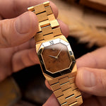 Rolex Cellini 4350 Octagon Wood from 1981. 27mm in 18k Yellow Gold Case with Flawless Burl Wood Dial, Manual Wind Caliber 1601, Original 18k Rolex President Bracelet.