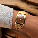 Vintage Rolex Cellini 4350 Watch Octagon Wood from 1981. 27mm in 18k Yellow Gold Case with Flawless Burl Wood Dial, Manual Wind Caliber 1601, Original 18k Rolex President Bracelet.