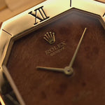 Vintage Rolex Cellini 4350 Watch Octagon Wood from 1981. 27mm in 18k Yellow Gold Case with Flawless Burl Wood Dial, Manual Wind Caliber 1601, Original 18k Rolex President Bracelet.