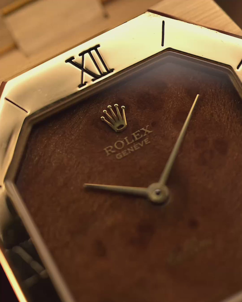 Vintage Rolex Cellini 4350 Watch Octagon Wood from 1981. 27mm in 18k Yellow Gold Case with Flawless Burl Wood Dial, Manual Wind Caliber 1601, Original 18k Rolex President Bracelet.