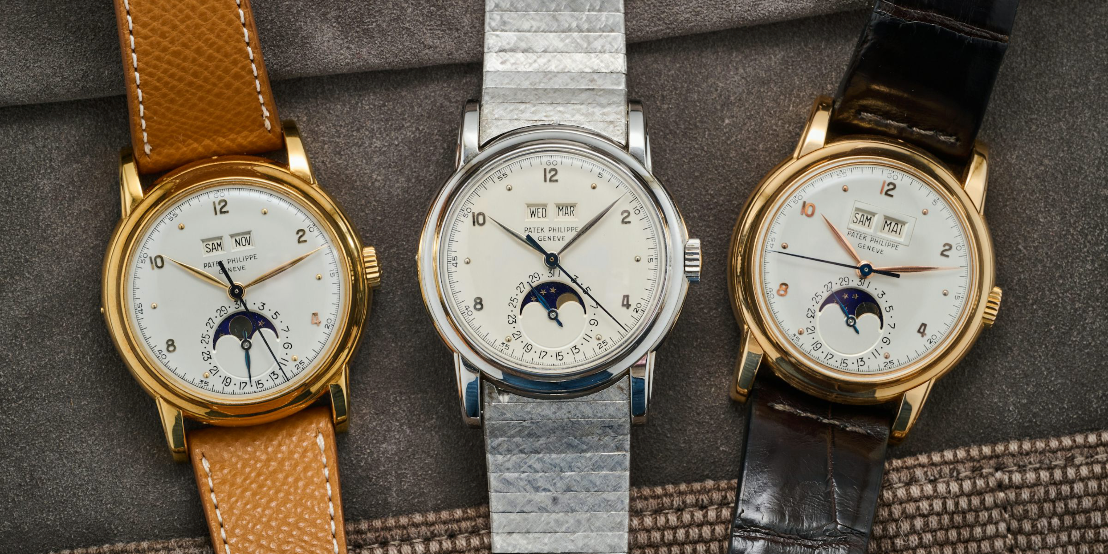 Un set di tre Patek Philippe 2497 d'epoca in oro giallo, rosa e bianco, provenienti da un'importante collezione svizzera.