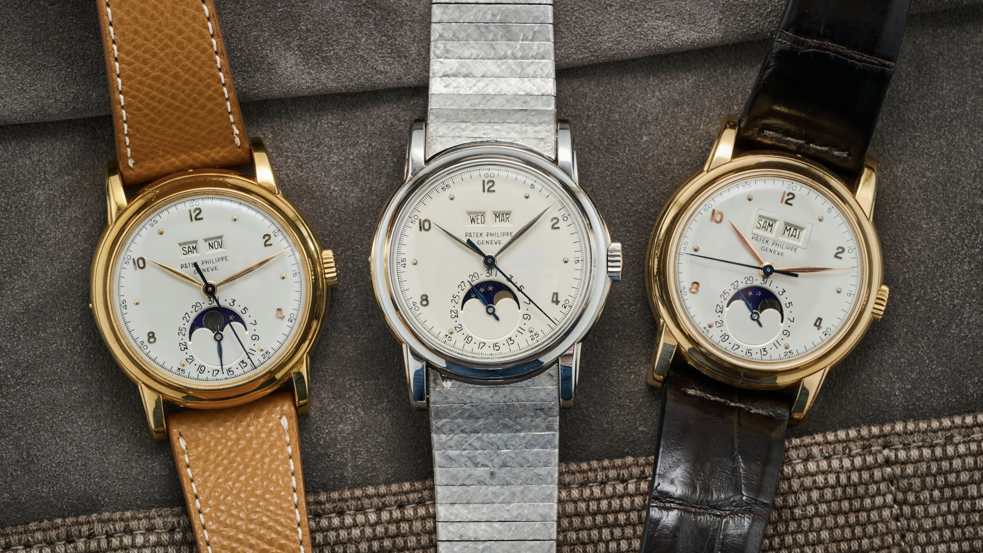 Un set di tre Patek Philippe 2497 d'epoca in oro giallo, rosa e bianco, provenienti da un'importante collezione svizzera.