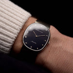 Audemars Piguet Vintage oro bianco Diamond Ellipse 1970 con quadrante nero e bracciale AP in oro bianco 18 carati