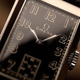 Siringa Omega rettangolare dorata 1930s