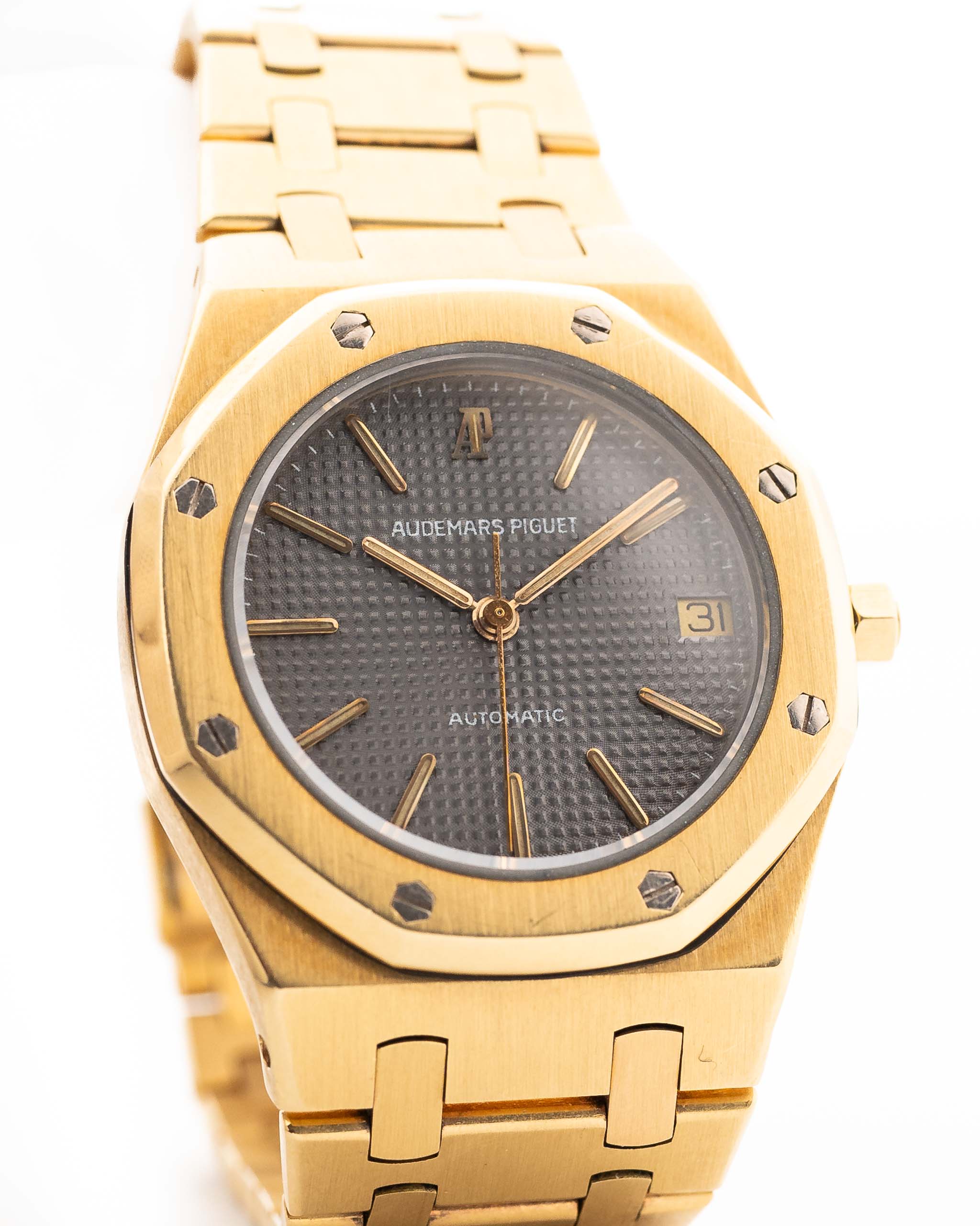 復古愛彼 Royal Oak Ref 4100BA 腕錶，1979 年製造。35毫米，18K黃金機芯，配2123自動機芯，灰色滾釘錶盤和金錶鏈。